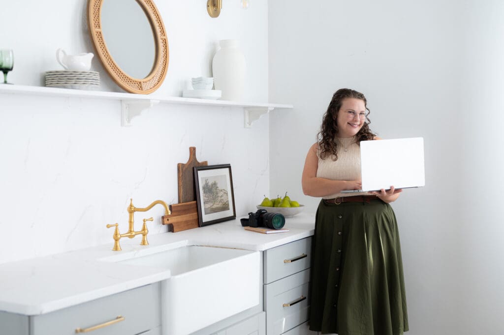 Emma Males of Males Marketing Studio working on photography SEO at her laptop
